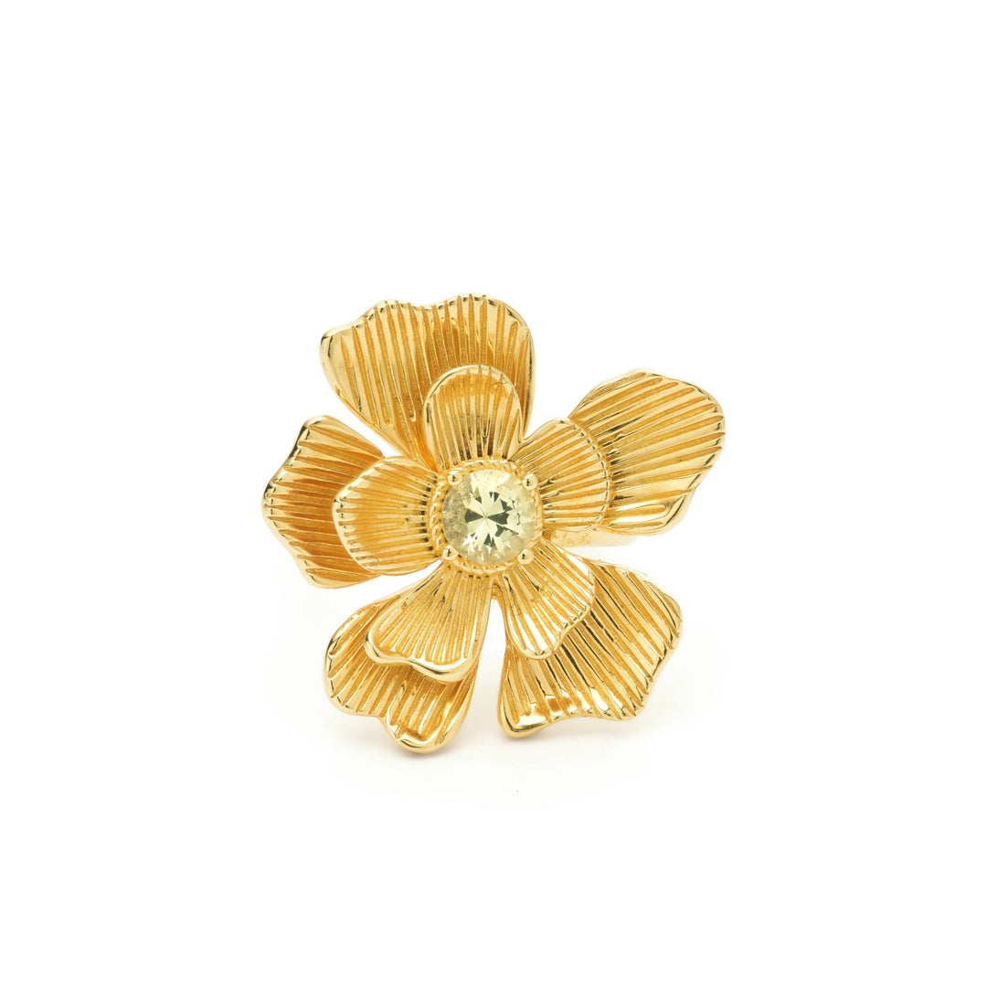 Bloemvormige statement ring met groene steen
