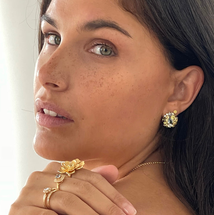 Bloemvormige statement ring met groene steen - 124154Y