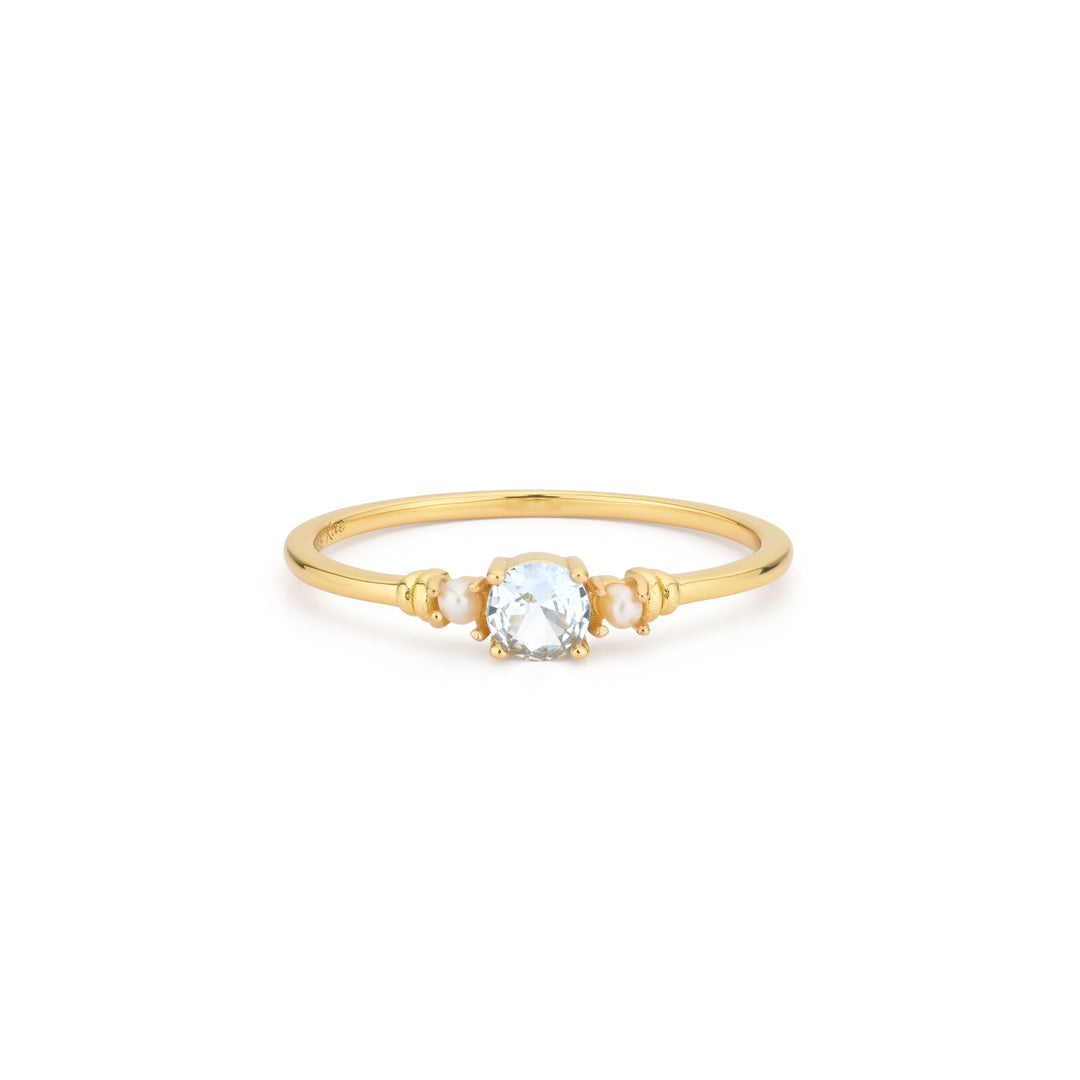 Ring with pearls and colored stone