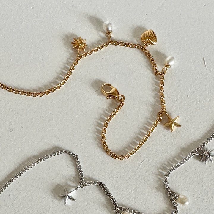 Armband met bedels en parels - 22464S