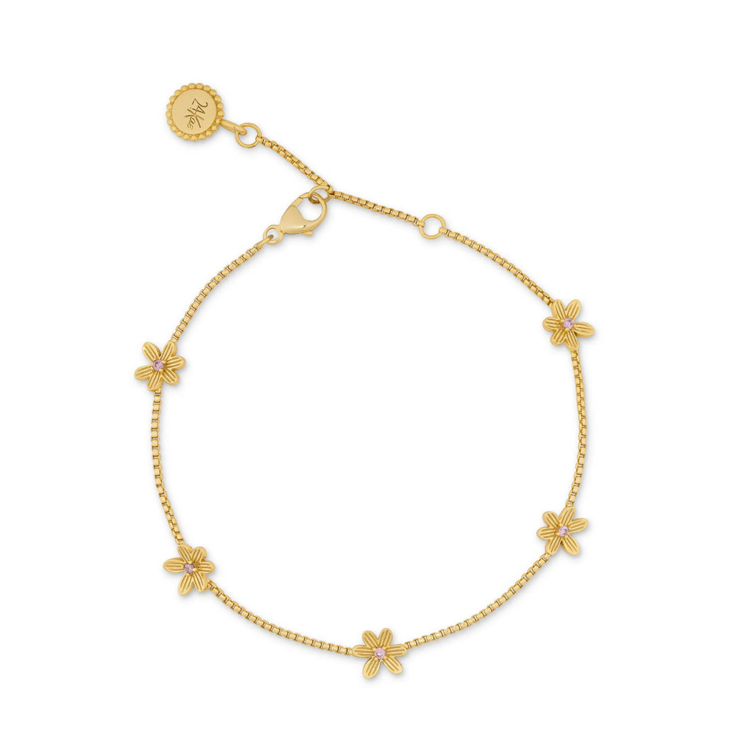Armband met kleine bloemen en roze steen