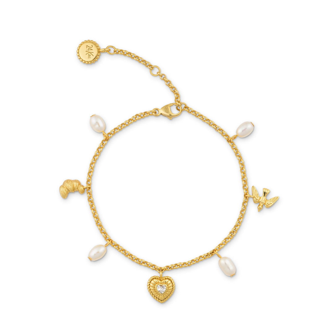 Charm bracelet with sweetwater pearls