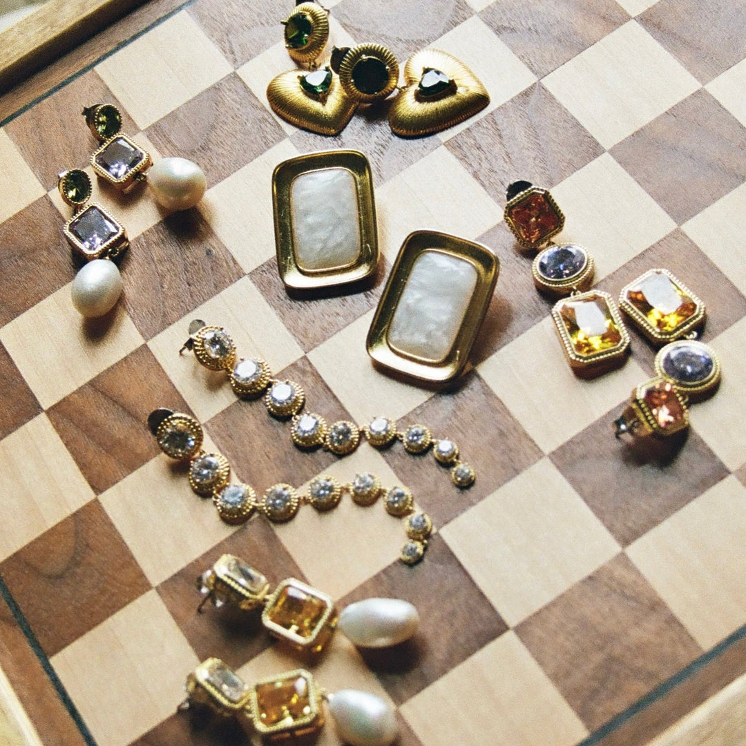 Bold diamond drape earrings