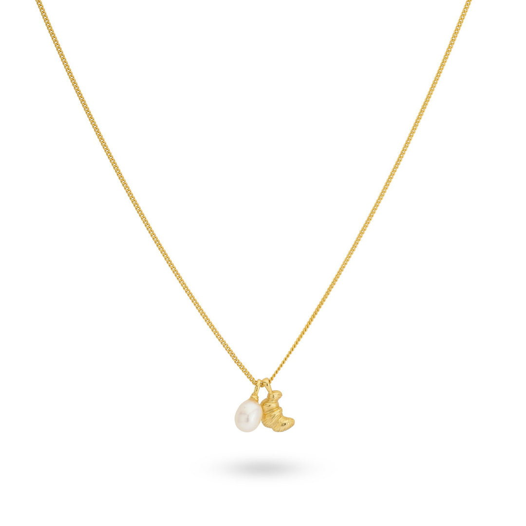 Necklace with croissant pendant and sweetwater pearl