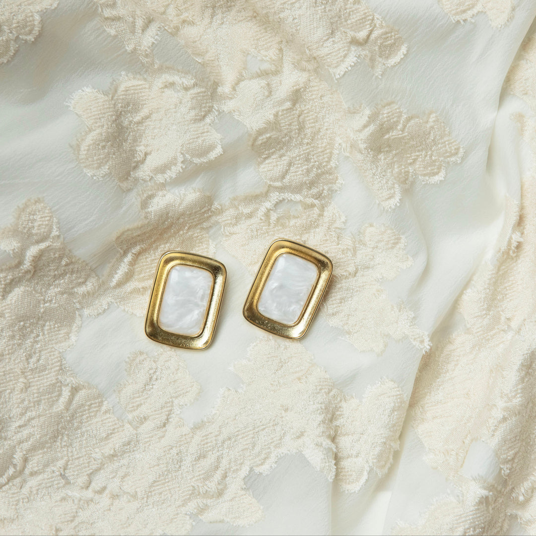 Bold pearl frame earrings