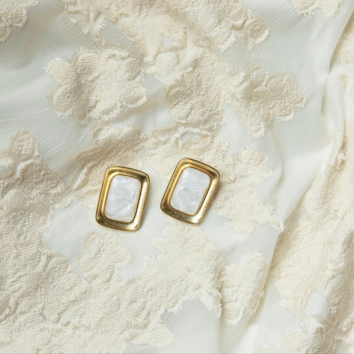 Bold pearl frame earrings