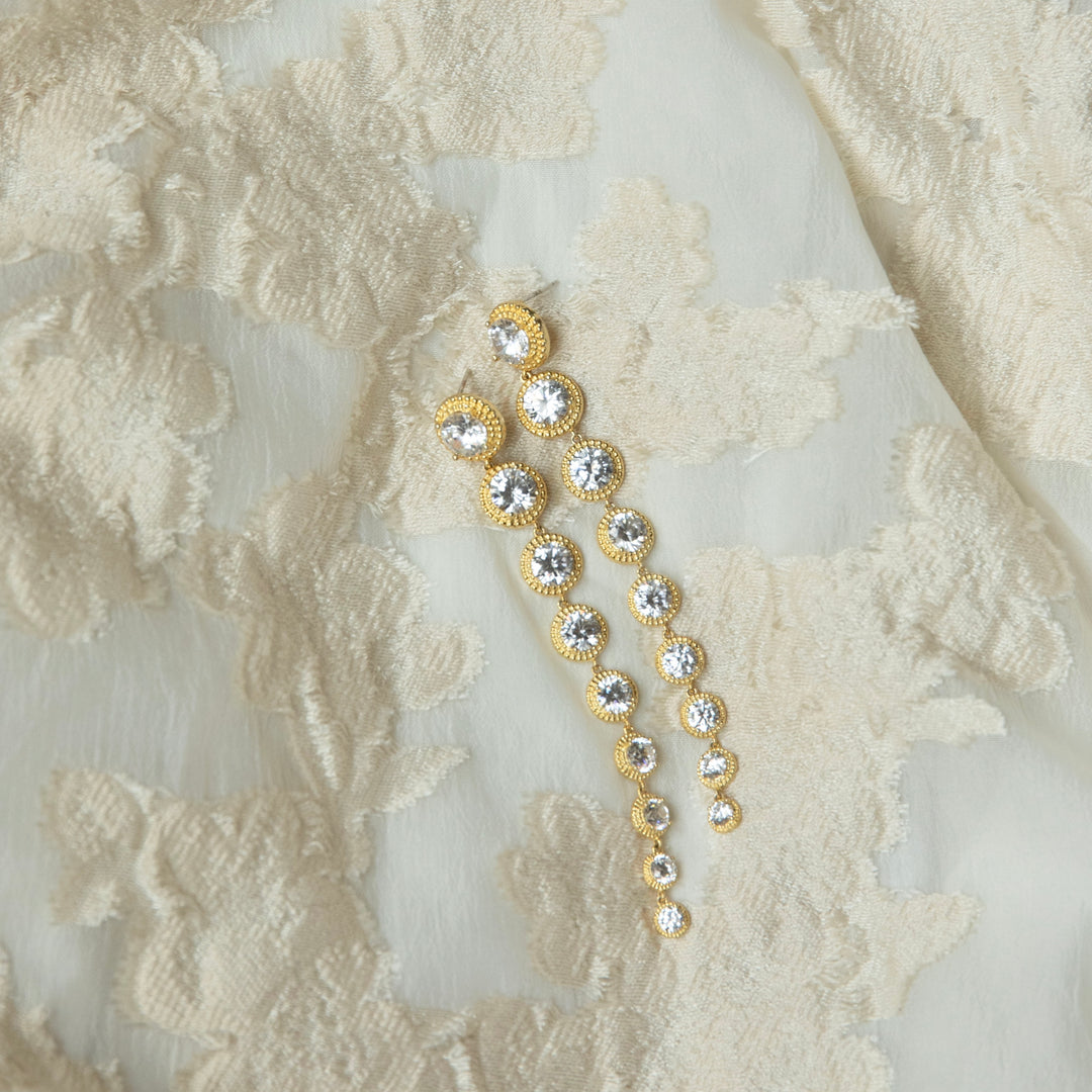 Bold diamond drape earrings