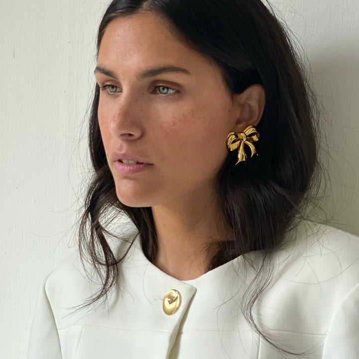 Bold golden bow earrings