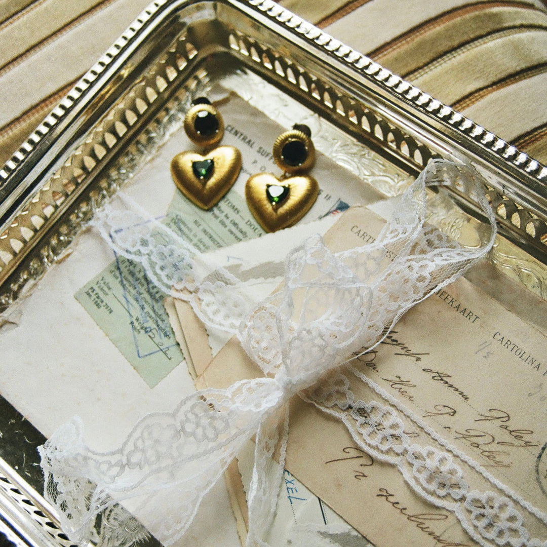 Bold peridot heartbeat earrings