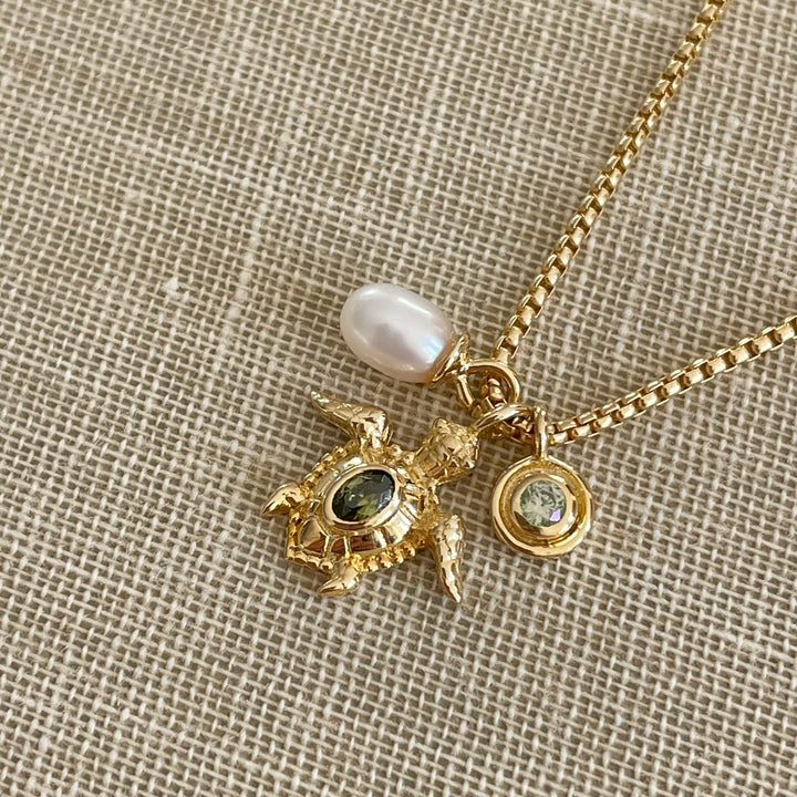 Ketting met schildpad en zoetwaterparel - 32483Y