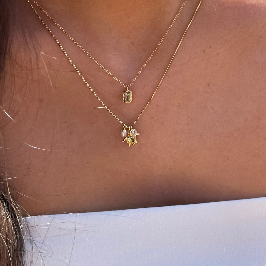 Ketting met schildpad en zoetwaterparel - 32483Y
