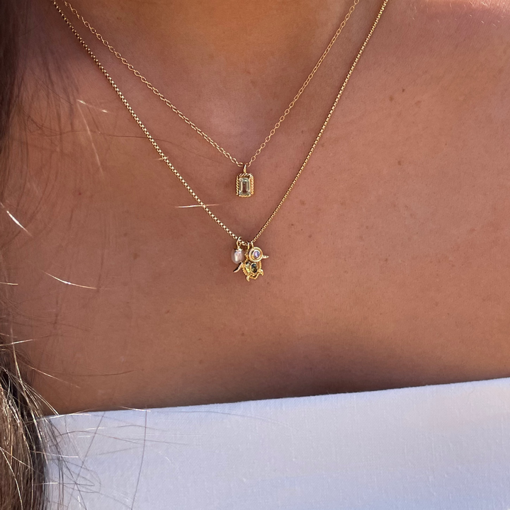 Ketting met schildpad en zoetwaterparel - 32483Y