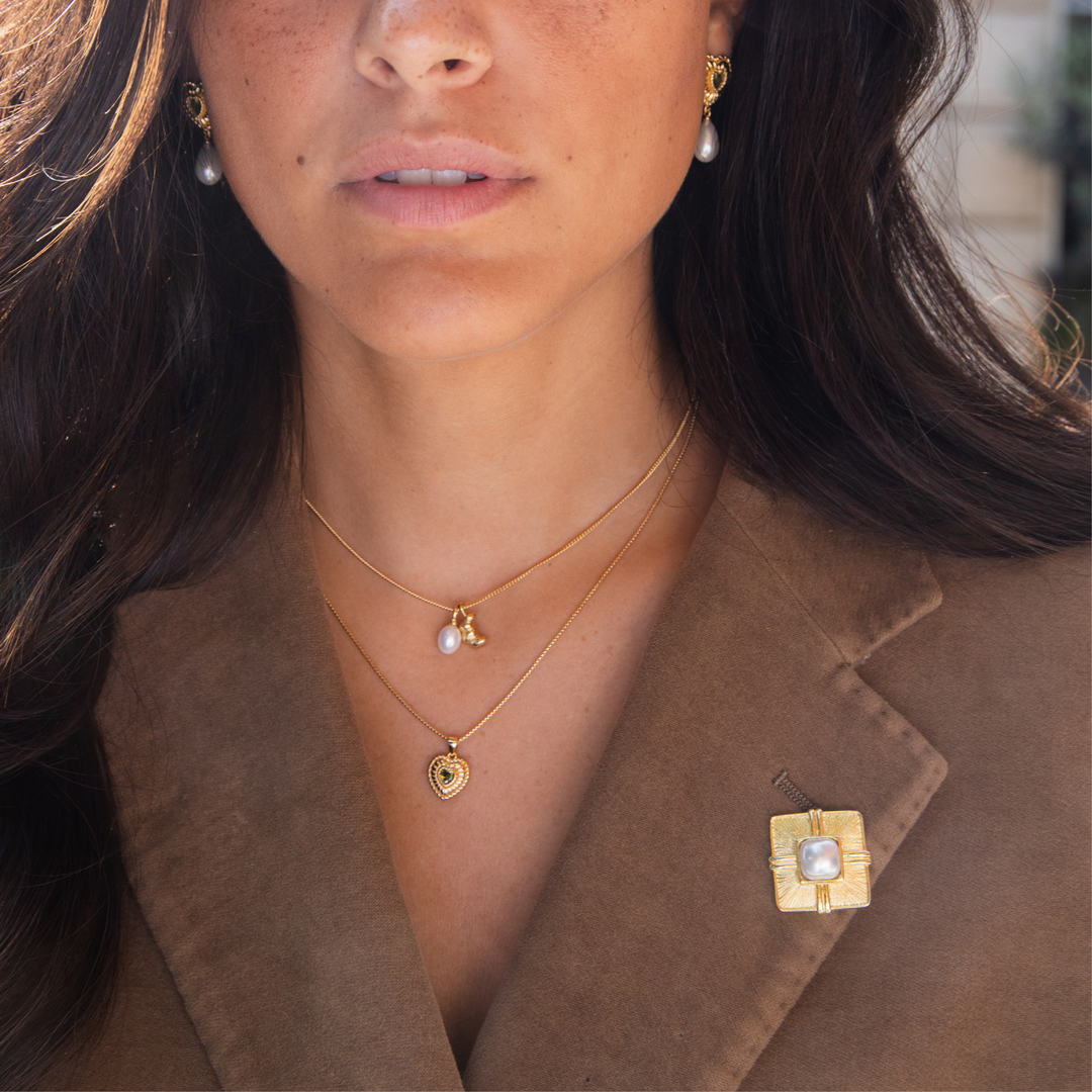 Bold mother of pearl broche