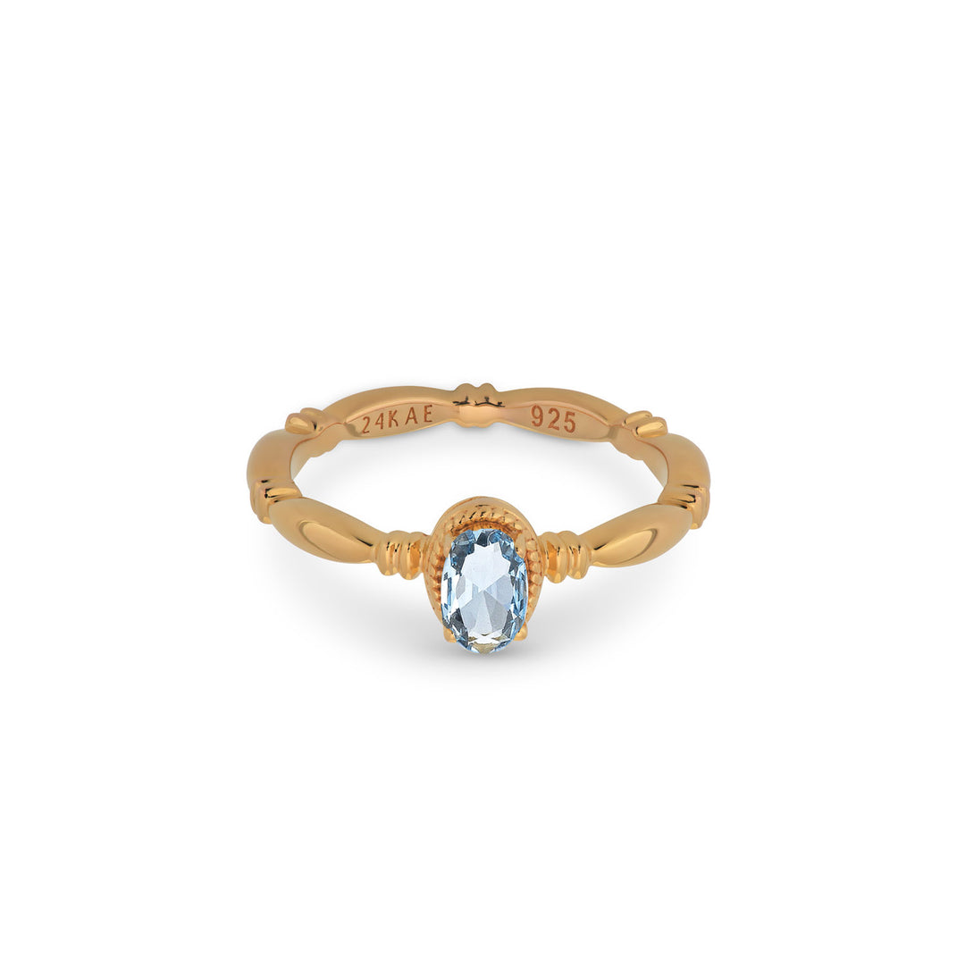 Ring met structuur en gekleurde steen
